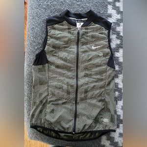 Nike full reflective running vest, dark green with black details.